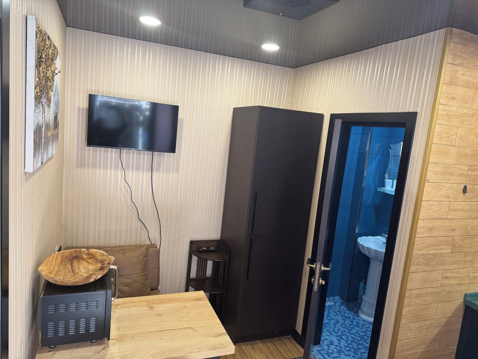 Dining table, sofa, TV, fridge, wardrobe, Wi-Fi & microwave included.