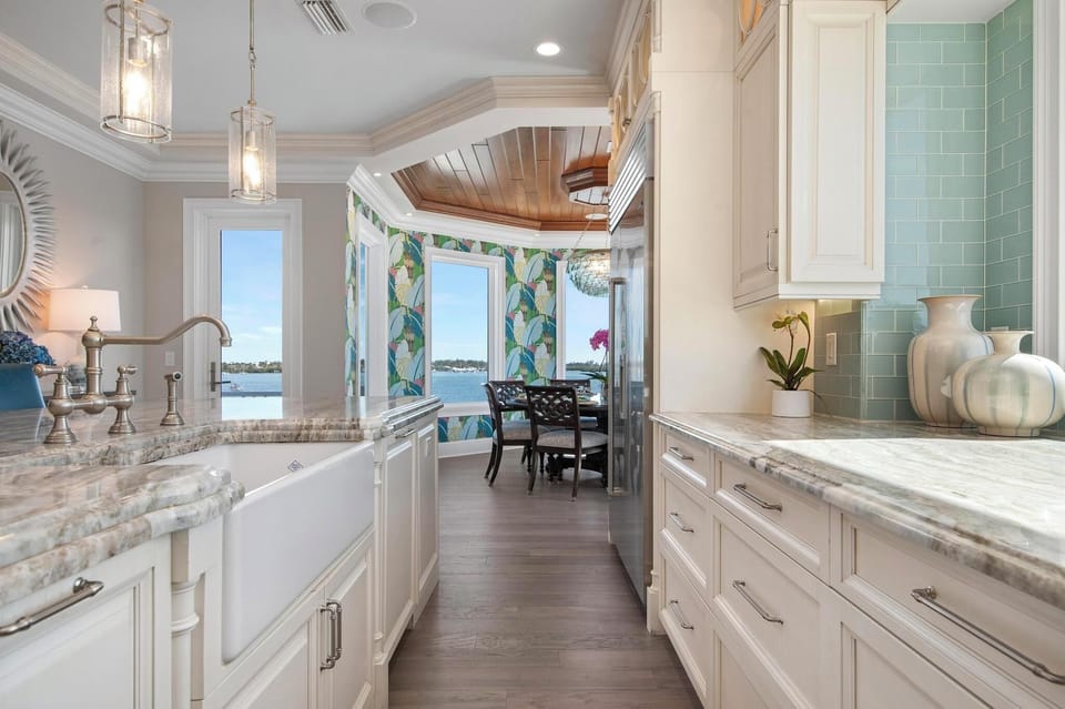 Upper level main kitchen with multiple Bay views. 