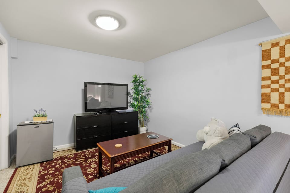 Spacious lounge with sleeper sofa and streaming TV