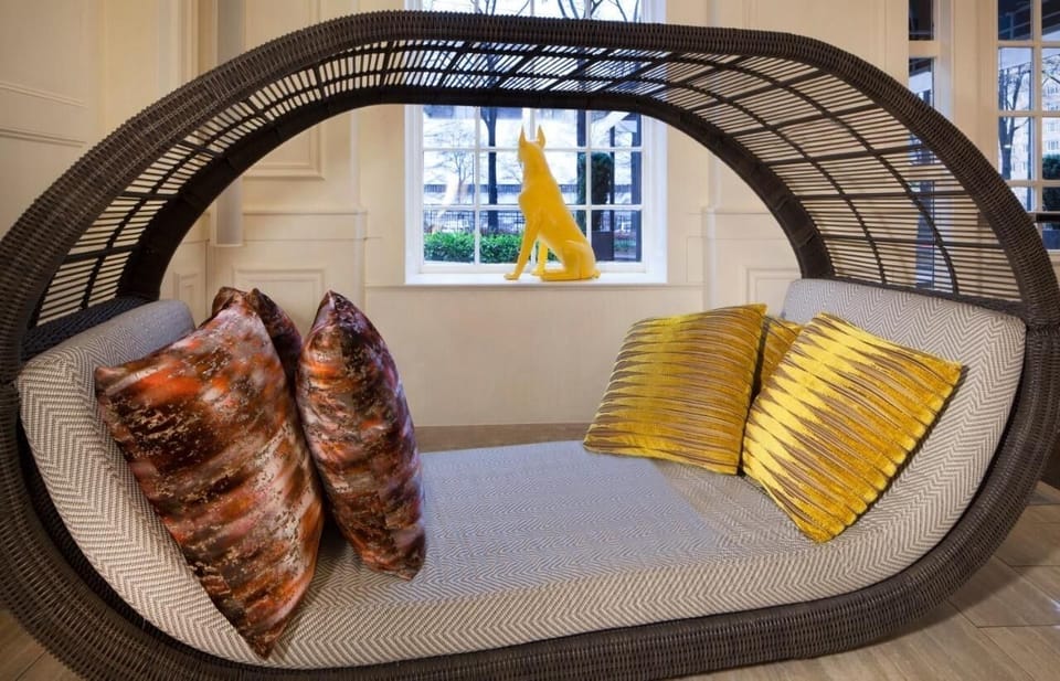 Stretch out on a cozy daybed for a quiet recharge.