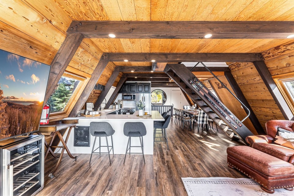 A chef's delight! The gourmet kitchen features sleek countertops, state-of-the-art appliances, perfect for meal prep or casual dining. Seating for 4 around the kitchen. A drip coffee maker is provided.