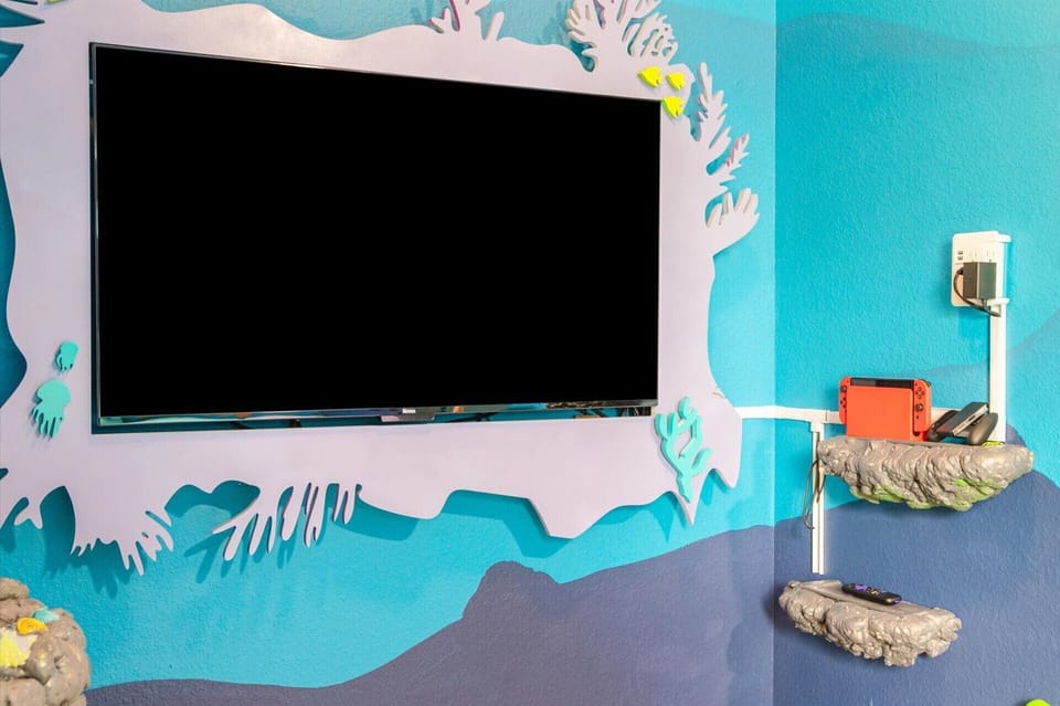 Welcome to the ultimate family fun zone! The kids' room is equipped with a Nintendo Switch and additional toys for endless entertainment and bonding moments—perfect for family game time after a day of adventure!