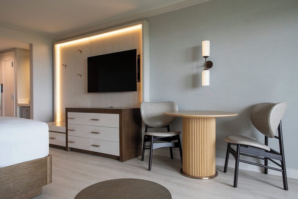 Enjoy casual dining or remote work at the stylish two-top table.