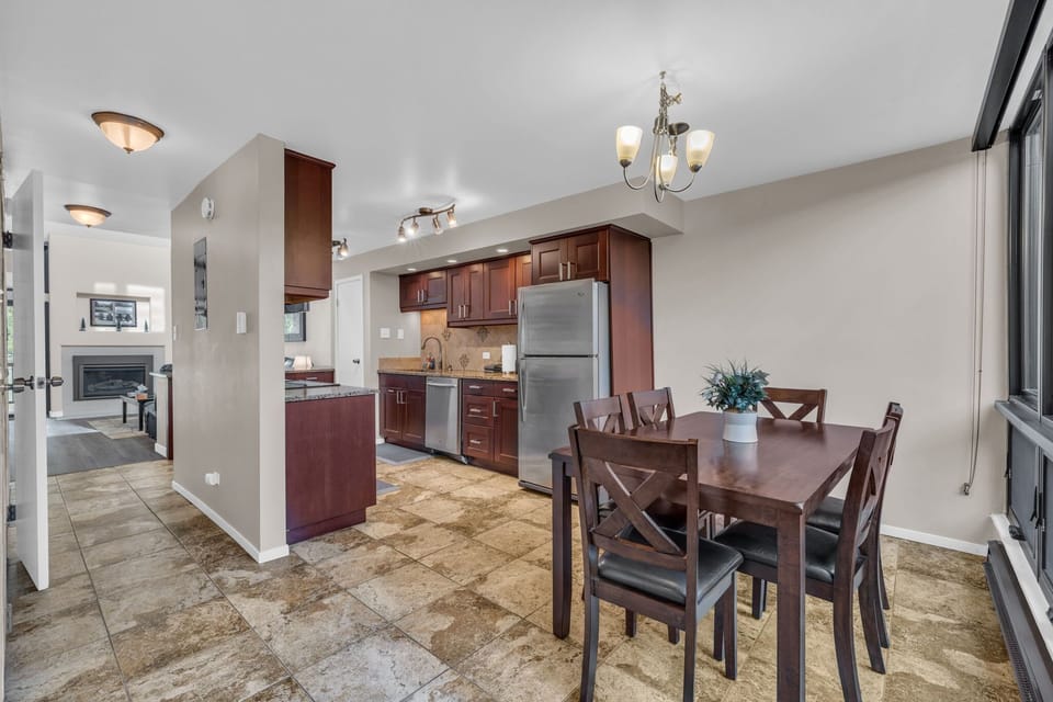 Kitchen and Dining Room: Well-equipped kitchen, Keurig, drip coffee maker, toaster, cooking utensils, tableware, 6-person dining table