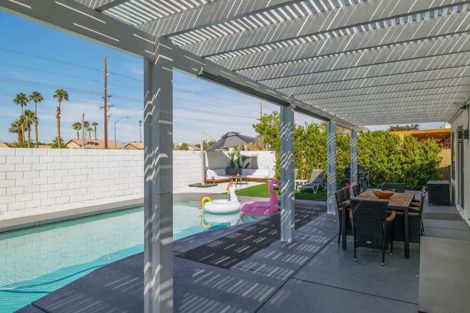 Shaded patio space ideal for outdoor dining and relaxation