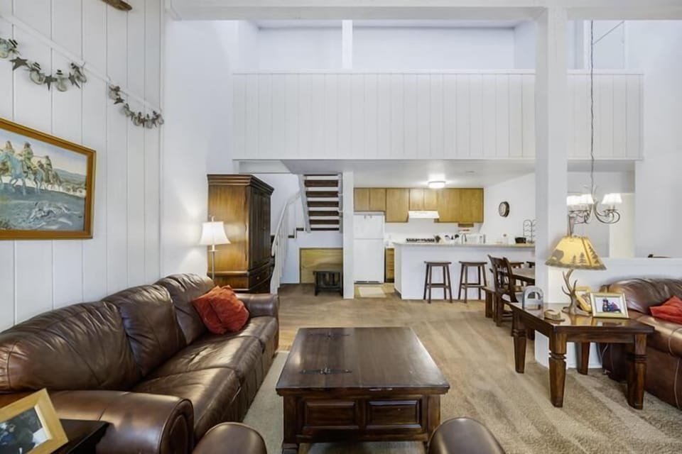 Open living space with wood flooring