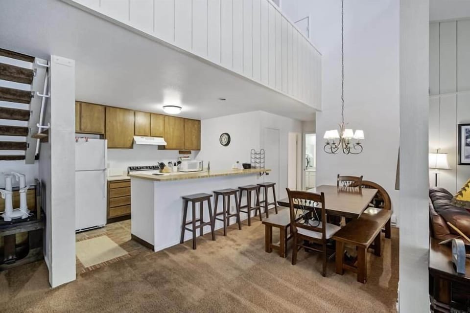 Kitchen with breakfast bar and bar stools