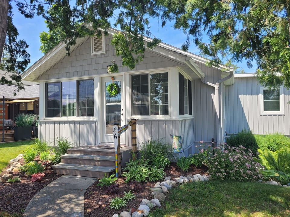 OVERVIEW:  The front of the home in summer.
