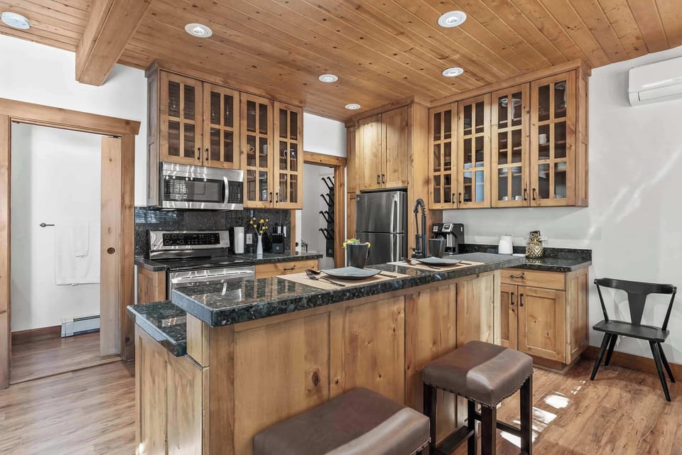Sip morning coffee or grab a bite at the kitchen counter, with seating for 2