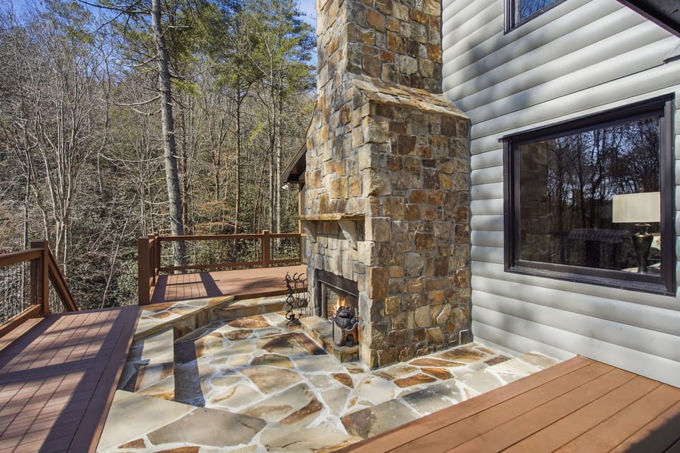 Enjoy the outdoor fireplace on the deck