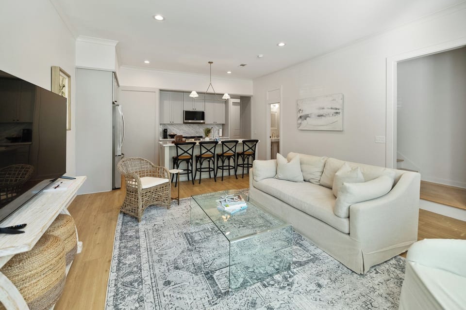 Open and Inviting! Enjoy the seamless flow between the stylish living room and modern kitchen – perfect for relaxing or entertaining.