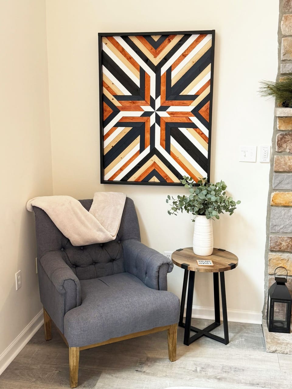 Cozy up in this comfy sitting chair, beautifully complemented by custom artwork.