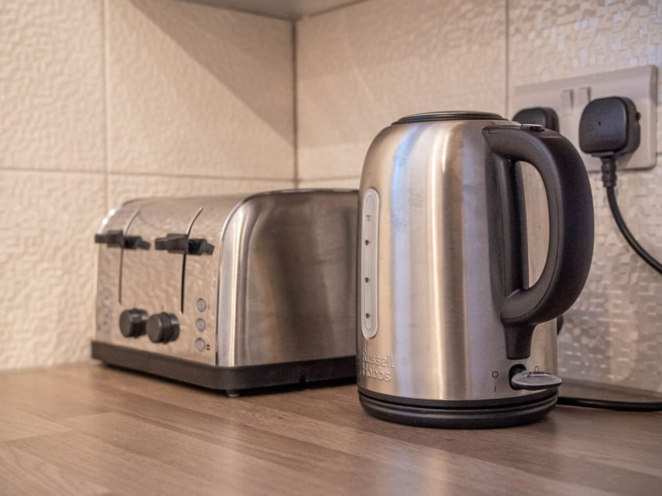 Equipped with essential cookware and utensils.