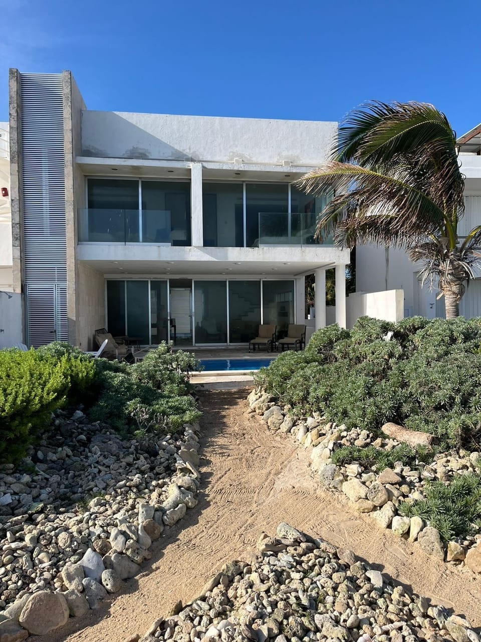 Back of the house and access to beach
