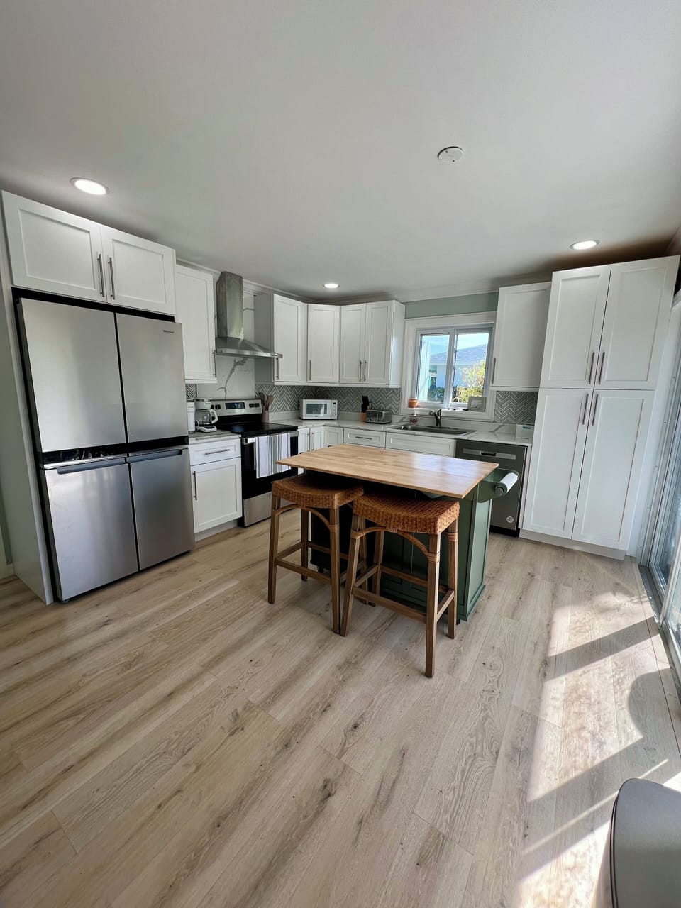 Cabinet pantry provided to allow for optimal use of counter space. 