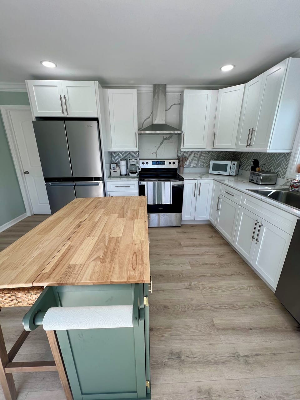 Rolling island provides more counter space and also more kitchen storage. 