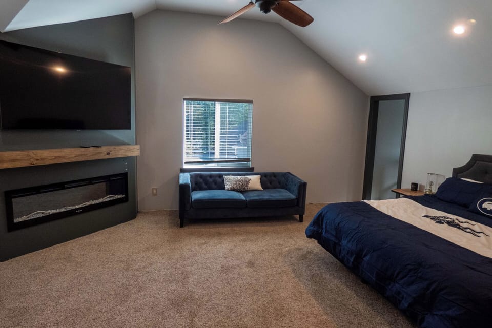 Electric fireplace in the principal suite.