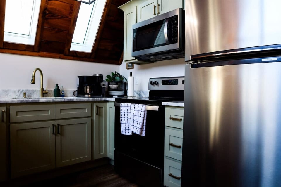 Whip up your favorite meals in this modern kitchen stocked with everything you need