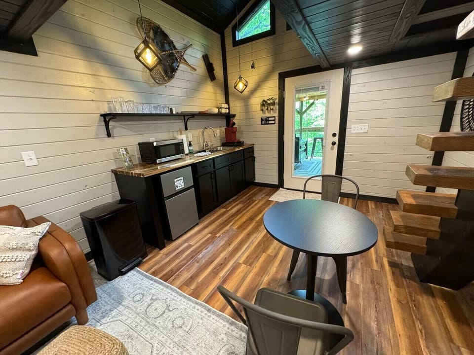 Kitchenette is fully equipped and features a mini fridge, microwave, toaster and Keurig coffee pot. The cute bistro table set is perfect for two!