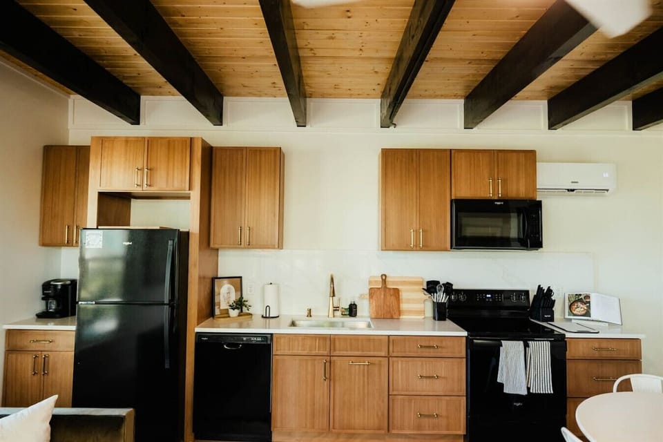 Modern kitchen featuring full-size appliances, ample counter space, and all the essentials