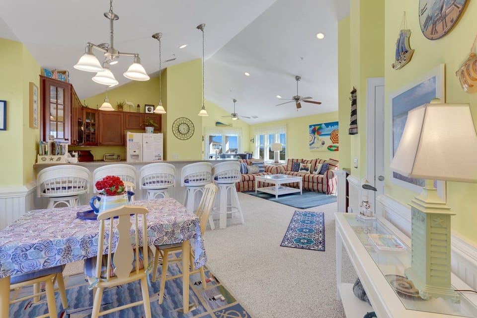The open-concept Living and Dining Area is breezy and welcoming!