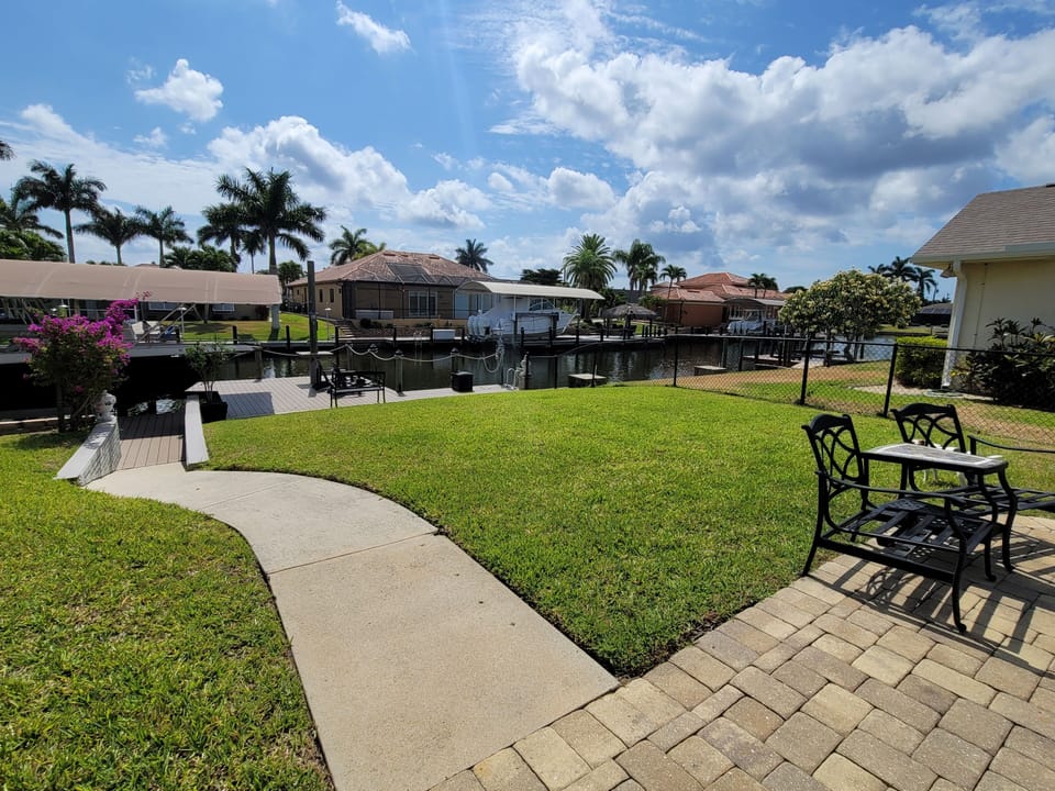 View of backyard and canal