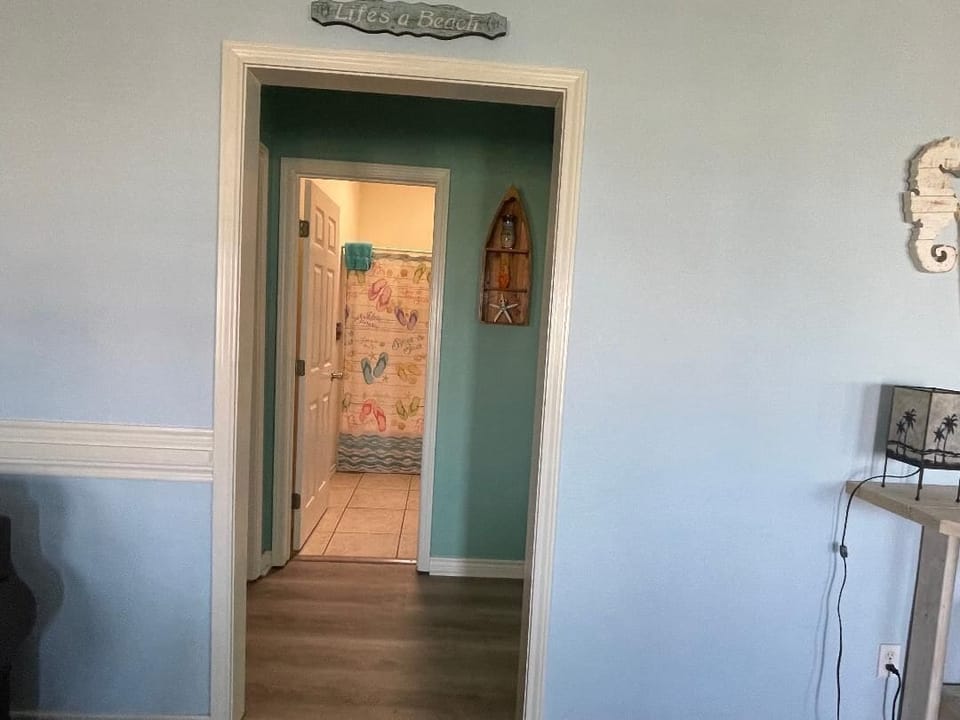 Hall bath with tub/shower and single sink