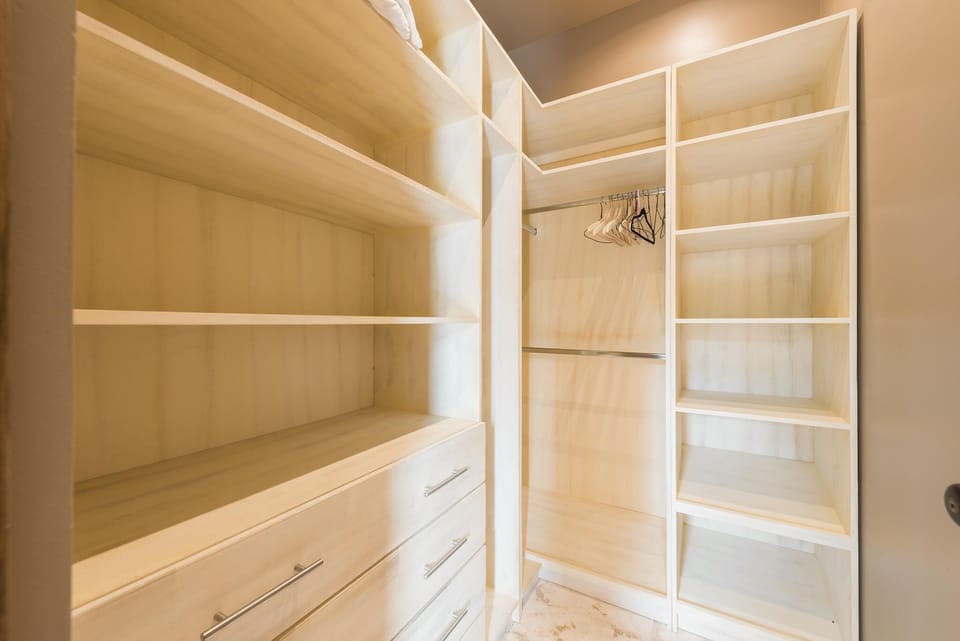 Spacious closet area for all your wardrobe essentials.