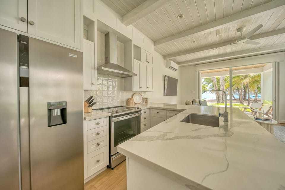 Brand new beach front condo with open concept living