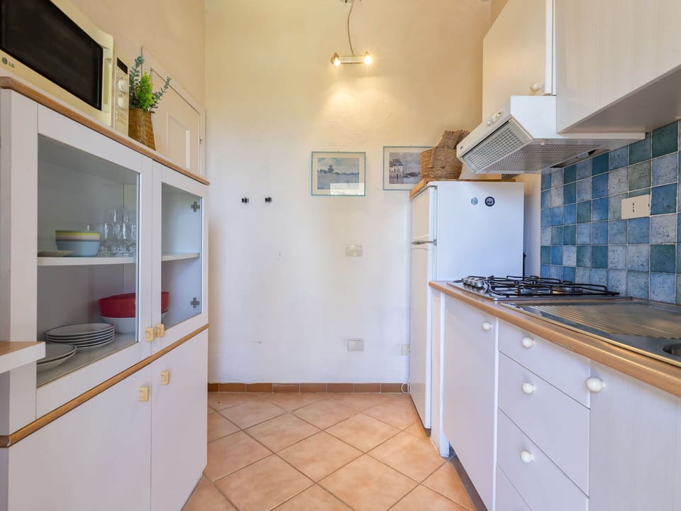 Cabinetry, Furniture, Property, Wood, Countertop, Lighting, Interior Design, Building, Floor, Flooring