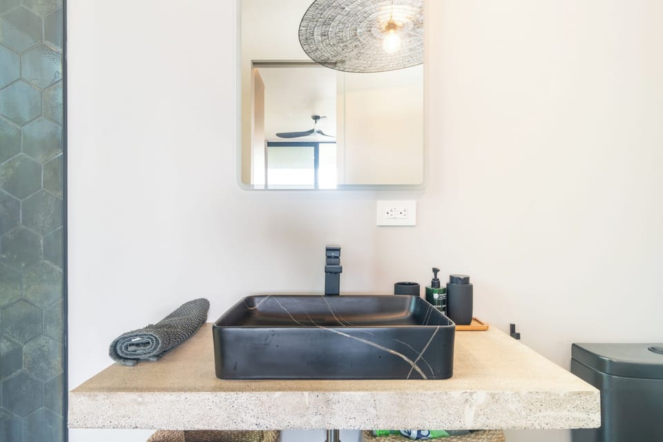 A stylish, contemporary washbasin that perfectly complements a luxurious bathroom setting.
