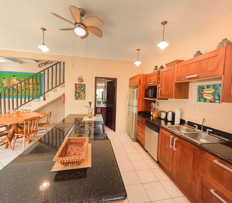 Spacious layout with a wide distance between the kitchen and central island.