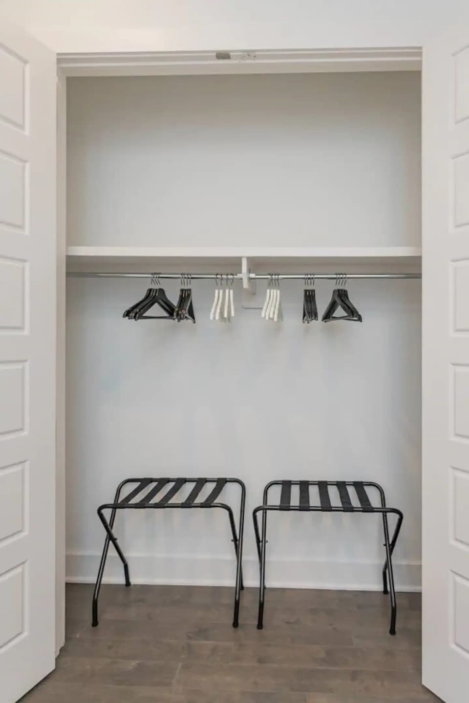 Ample storage space for your belongings, complete with hangers and luggage racks.