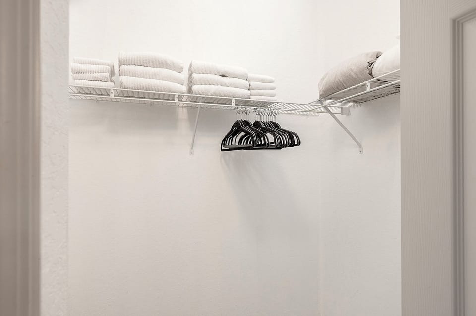 Primary bedroom walking closet