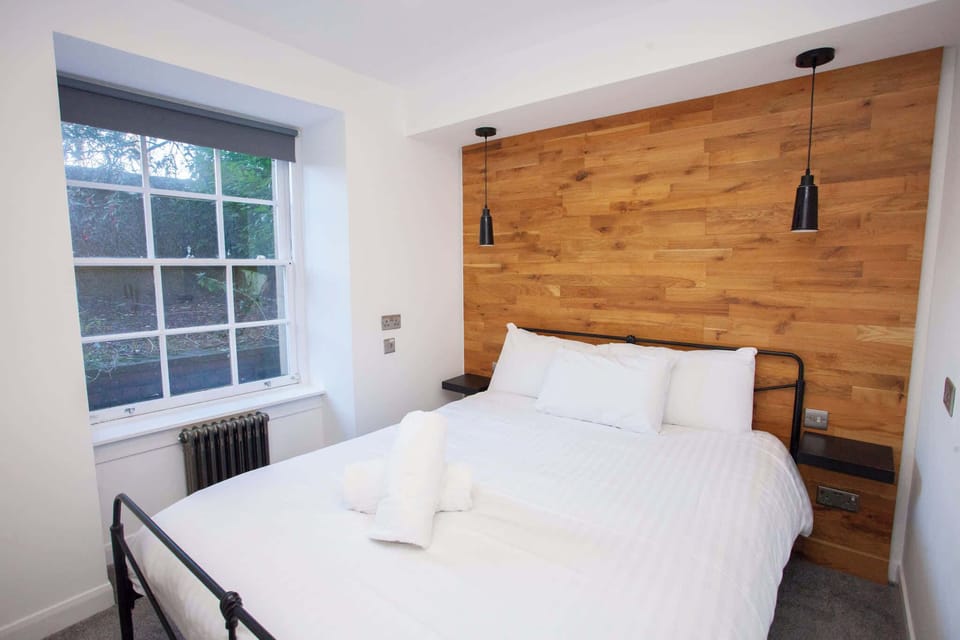 Rest your head on this super comfortable bed after a long day exploring the city