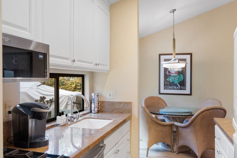Morning coffee and breakfast here would be a dream! Love how the kitchen opens up to this charming nook