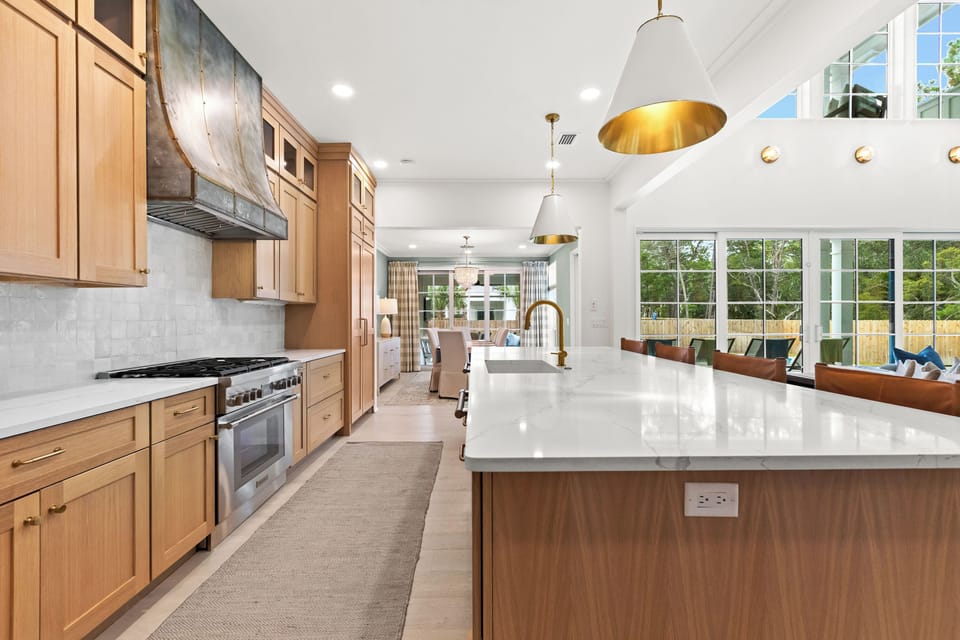 A Thermador oven and range featured in the kitchen