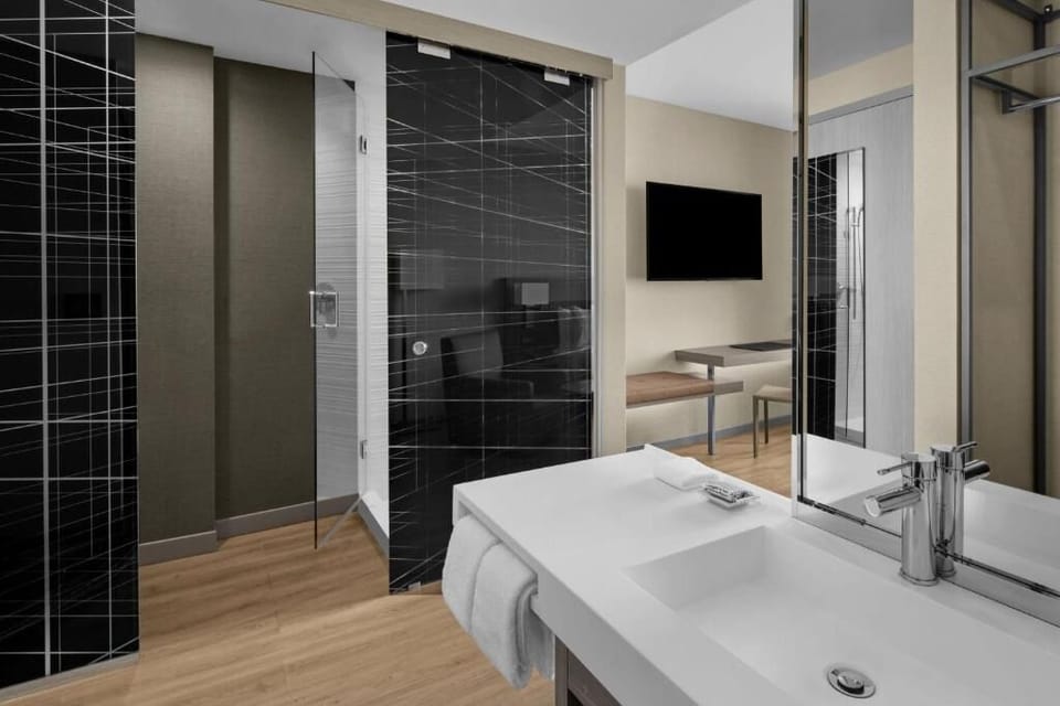 Get ready with an oversized mirror and easy-to-reach essentials.