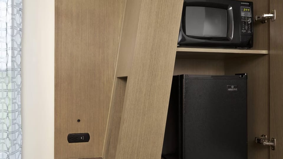 Enjoy easy snacks anytime with in-room microwave and mini fridge.