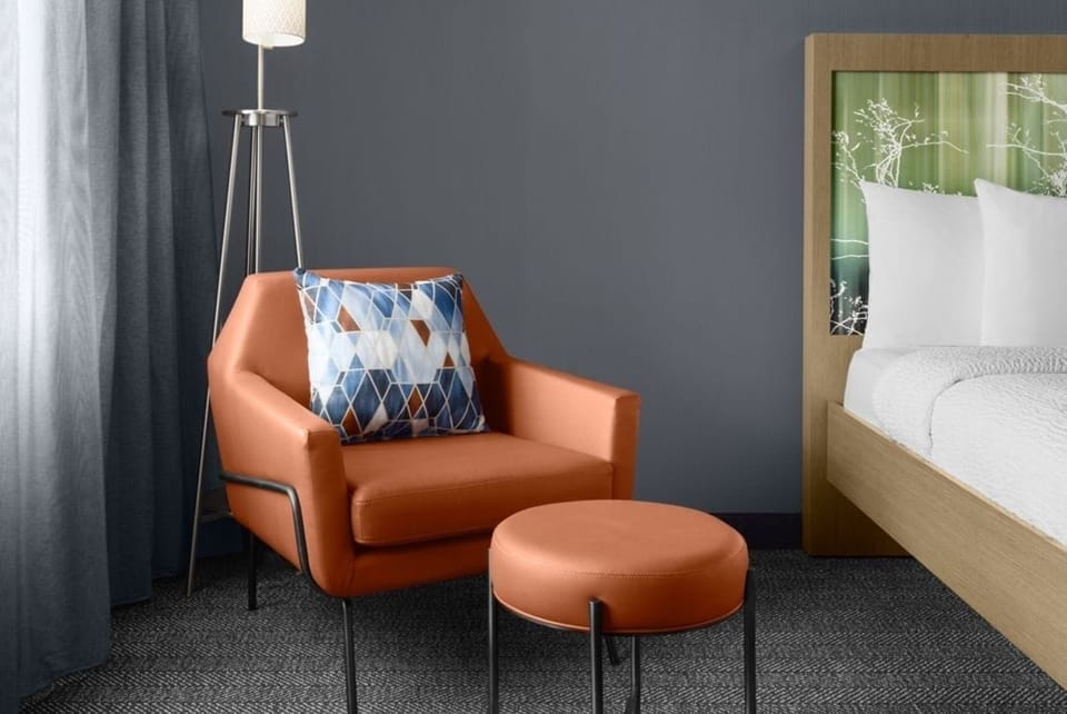 Sink into the lounge chair and savor a quiet reading moment.