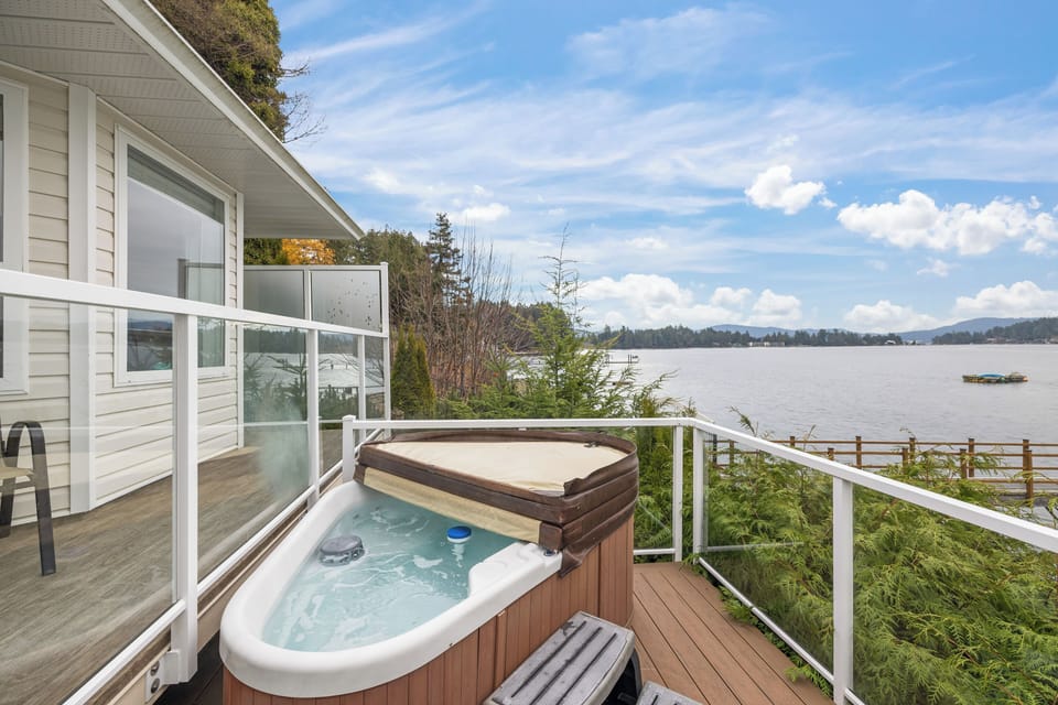 Relax and soak in the hot tub while listening to the waves along the shore.
