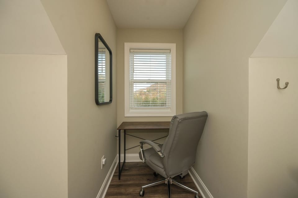 Desk and chair in dormer (In 2 of the 3 upstairs rooms)