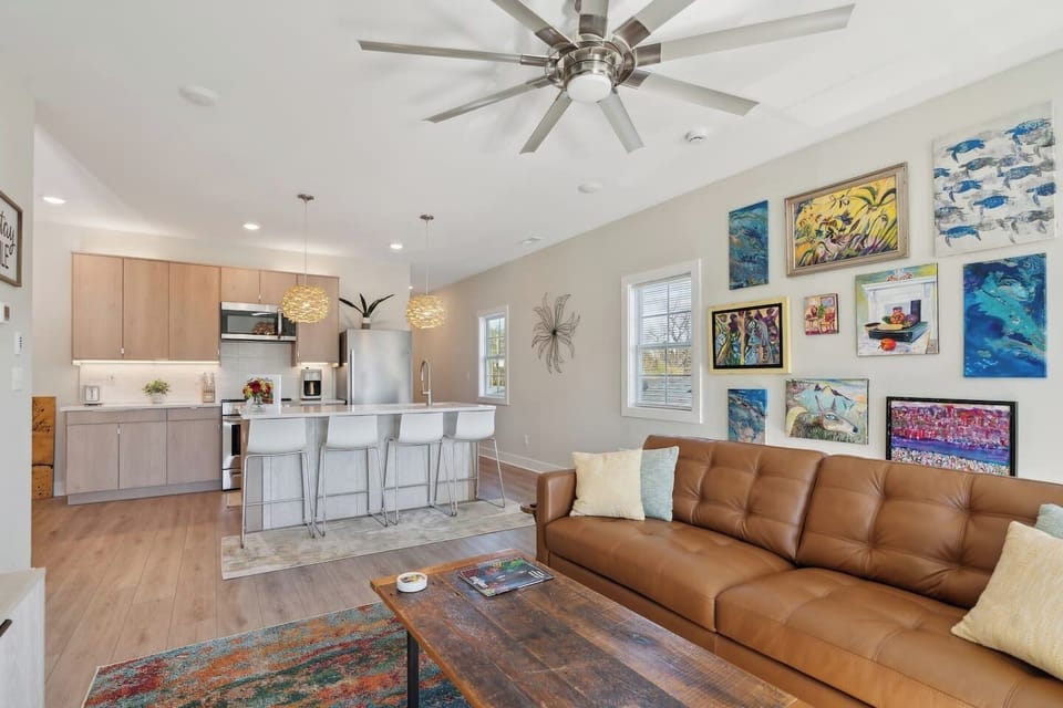 Beautiful living room area with gallery of local art.