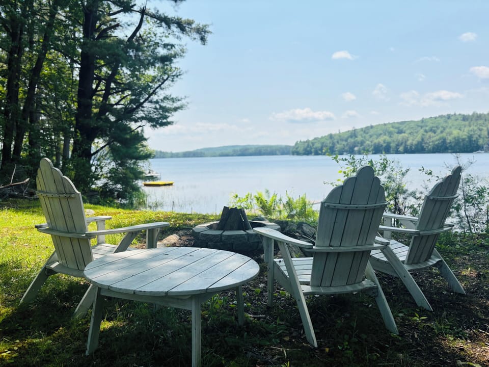 Breathtaking lakeside view by the fire.