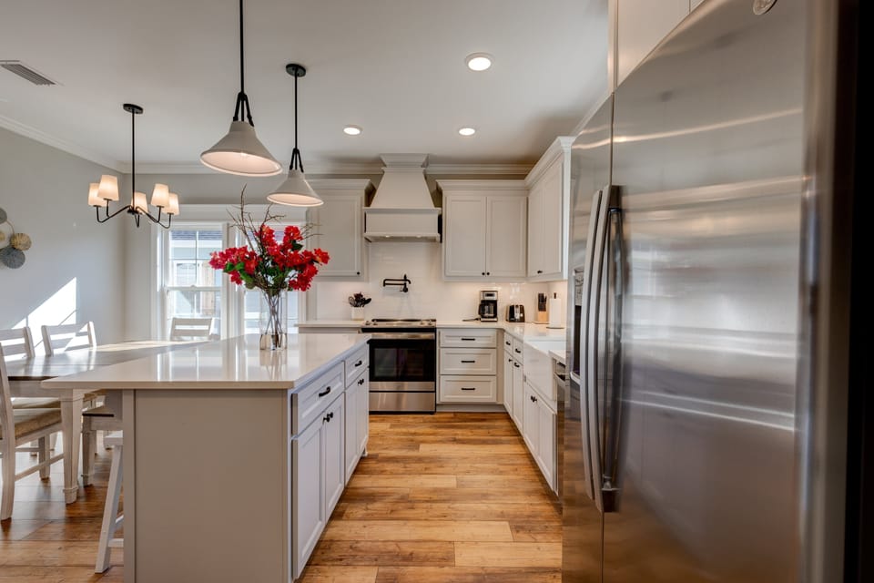 207 Palm Island kitchen with island and stainless appliances