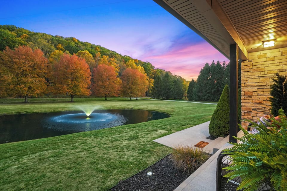 Relax by the pond and enjoy the calming fountain (seasonal) amidst a stunning natural backdrop.
