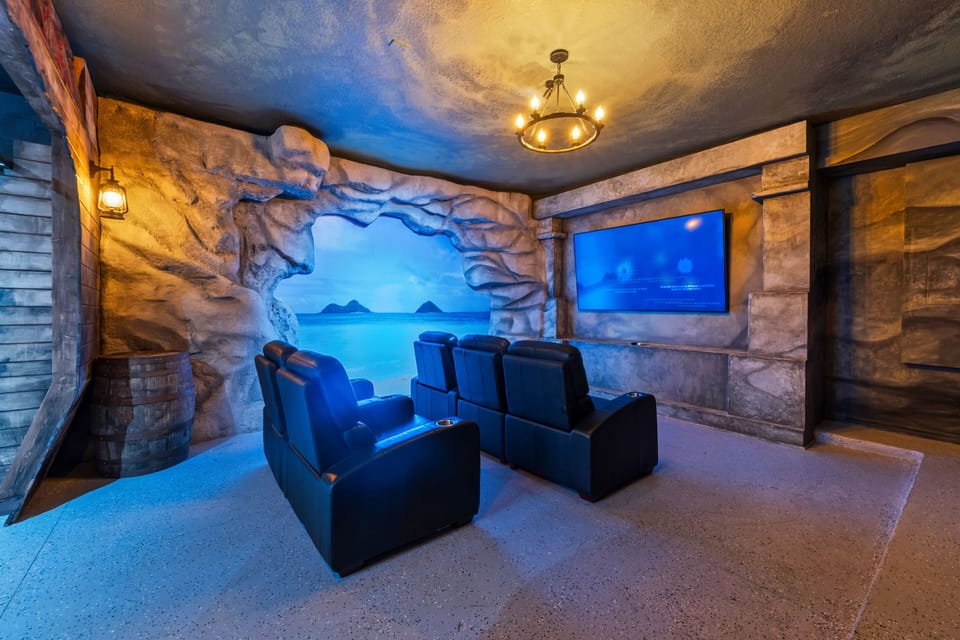 - Family movie theater with luxury recliners and screen  
- Themed cave-style walls for immersive experience  
- Enjoy movie nights and streaming after Disney parks