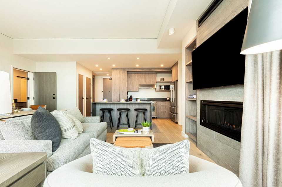Cozy space with a warm gas fireplace and a smart TV