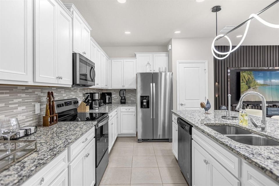 Whip up culinary delights in a modern space with stunning granite countertops!