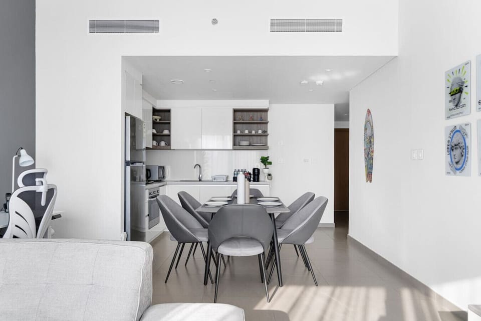 Bright and cozy dining room filled with natural light and stylish décor